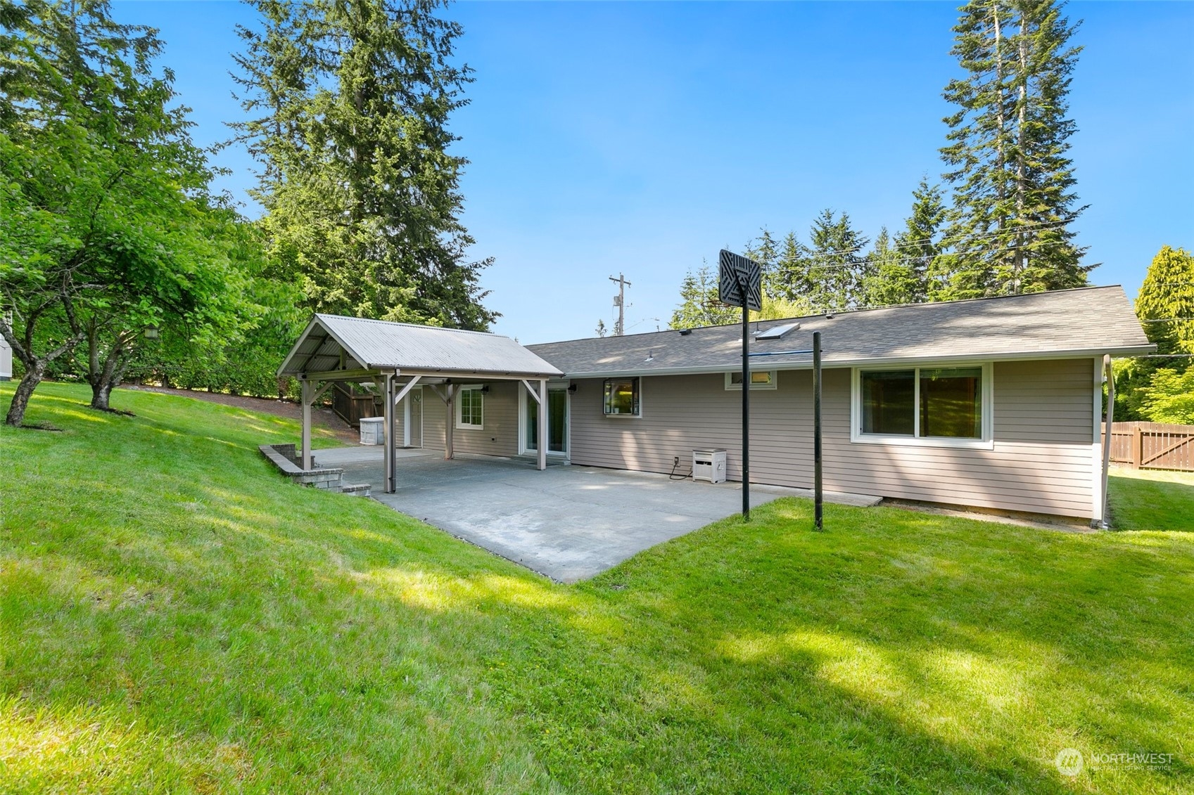 5409 Seahurst Avenue Everett, WA 98203 - Photo 21 of 26 a view of a house with a yard and sitting area