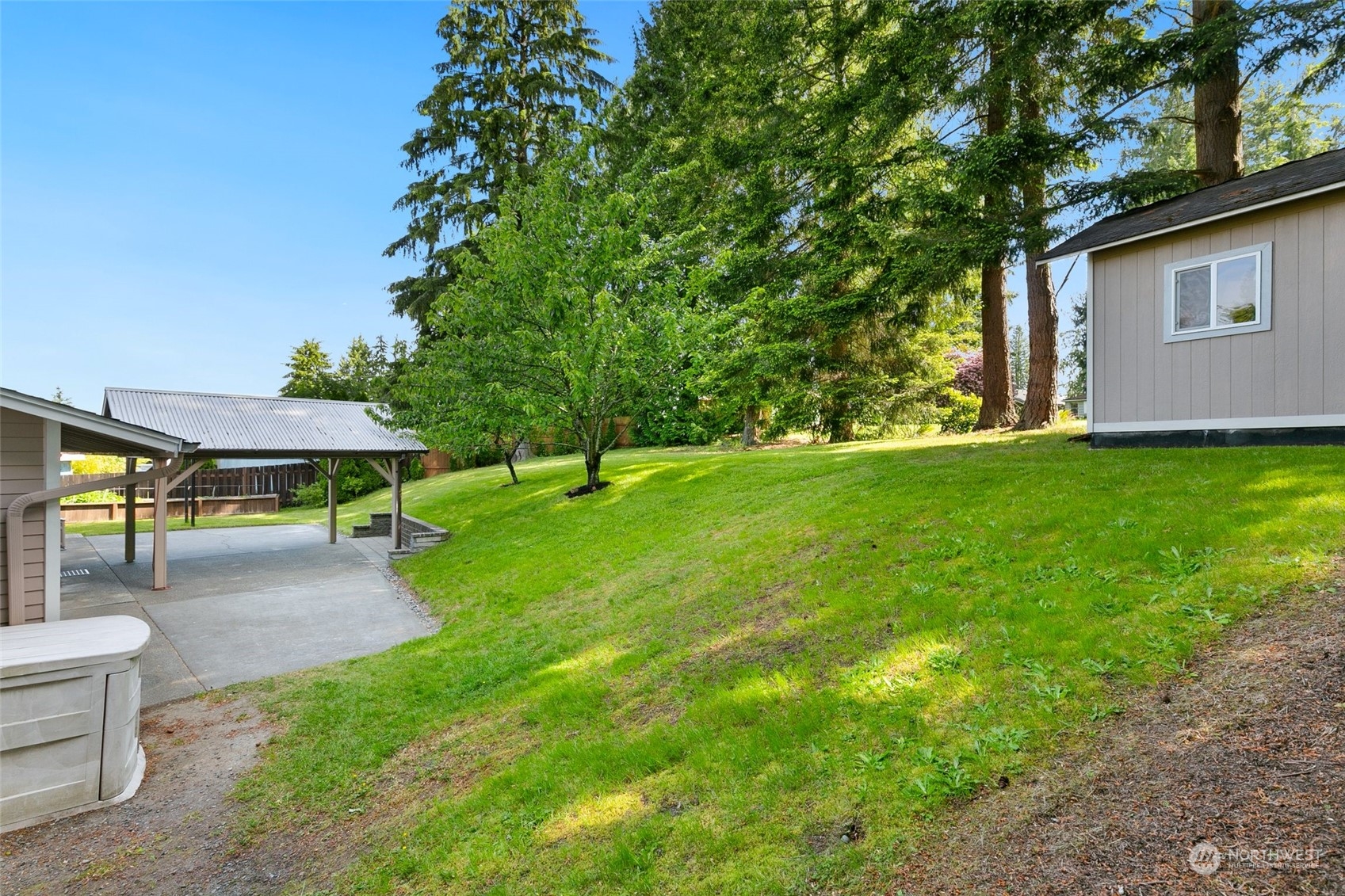 5409 Seahurst Avenue Everett, WA 98203 - Photo 23 of 26 a view of a backyard with a garden