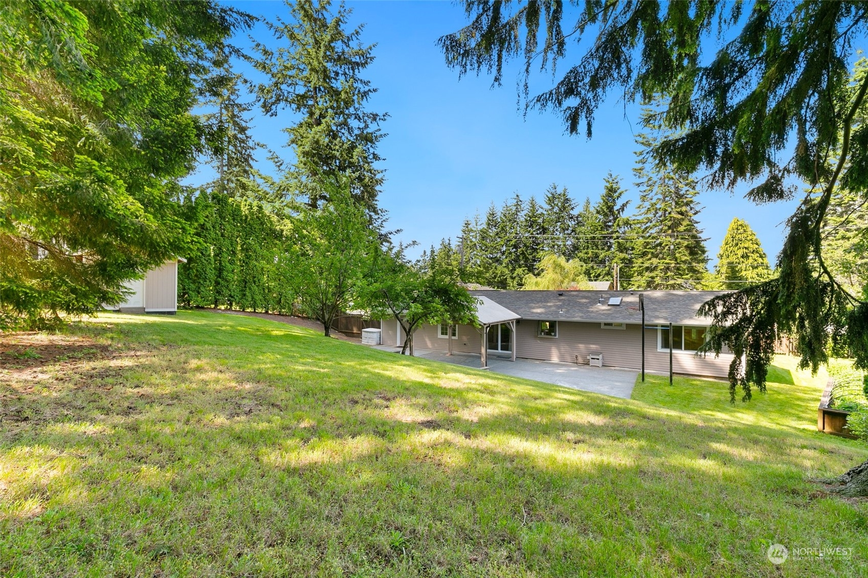 5409 Seahurst Avenue Everett, WA 98203 - Photo 24 of 26 a view of a house with a swimming pool