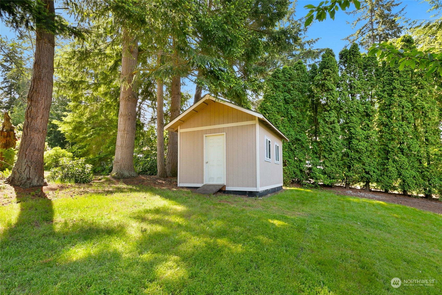 5409 Seahurst Avenue Everett, WA 98203 - Photo 25 of 26 a view of a house with a yard