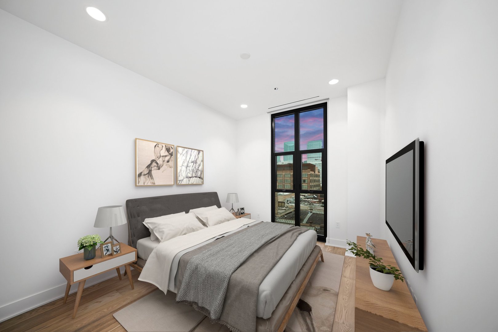 900 West Washington Boulevard, Unit 504 Chicago, IL 60607 - Photo 16 of 28 a bedroom with a bed and a flat screen tv