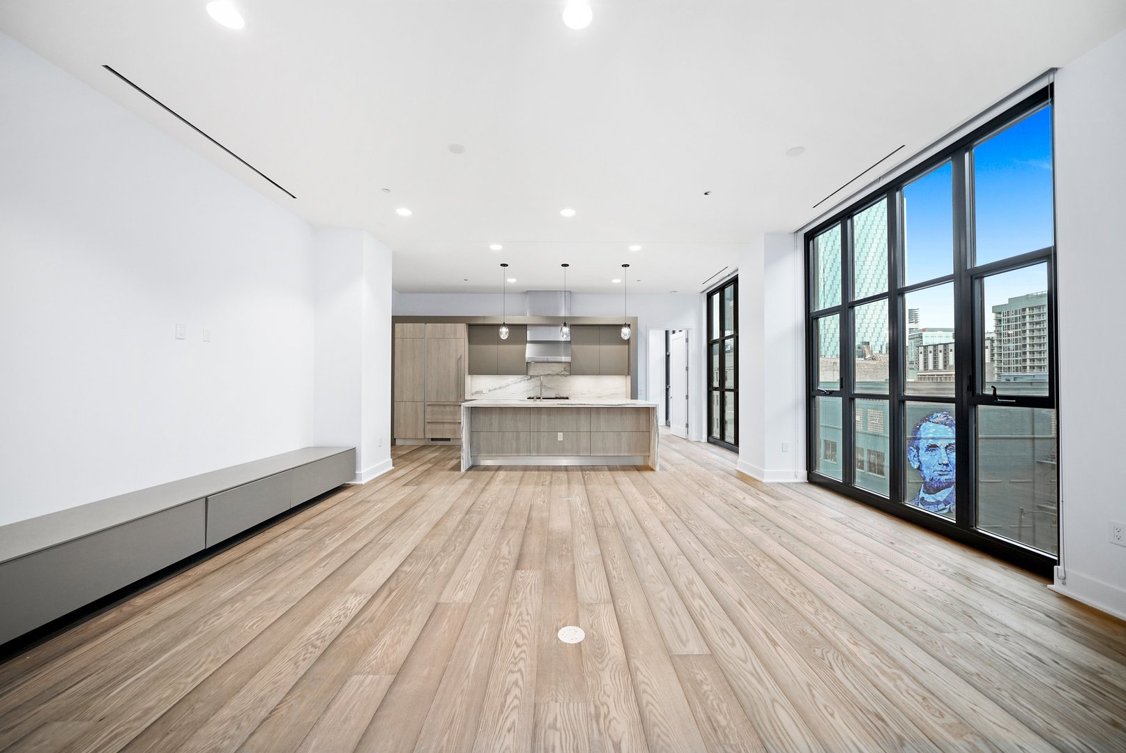 900 West Washington Boulevard, Unit 504 Chicago, IL 60607 - Photo 3 of 28 a view of a room with wooden floor and windows