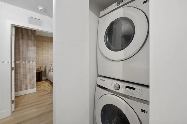 a utility room with dryer and washer