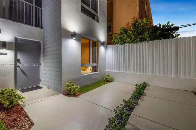 a front view of a house having yard
