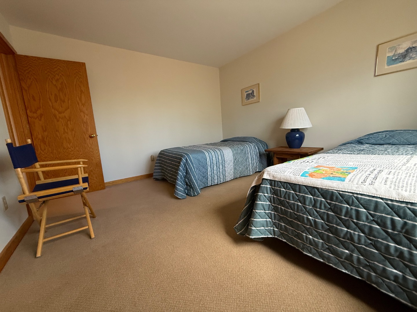 82 Oyster Pond Road Edgartown, MA 02539 - Photo 30 of 53 a bedroom with two beds and a desk