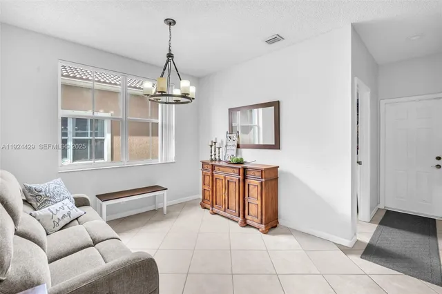 a bathroom with a sink toilet and mirror
