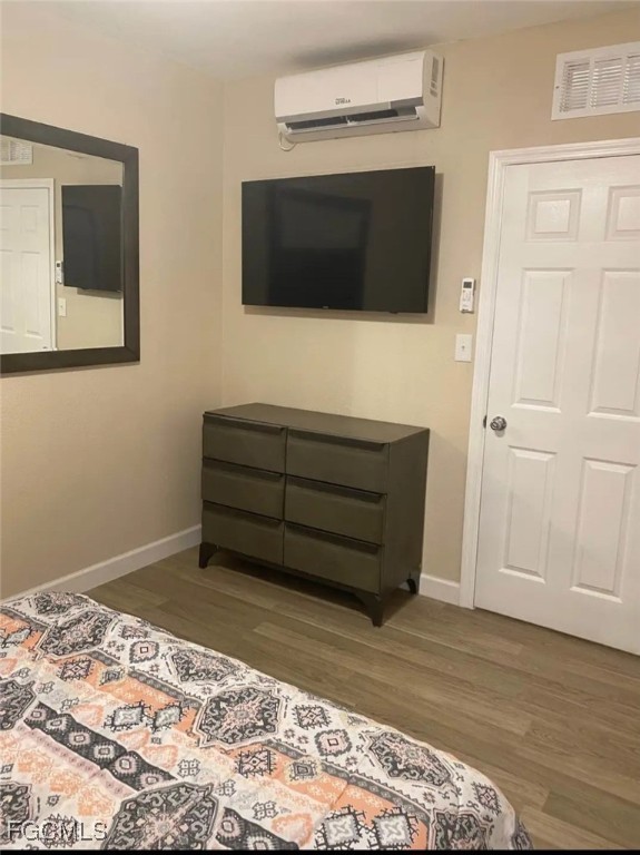 5230 32nd Avenue Southwest Naples, FL 34116 - Photo 7 of 11 a living room with a flat screen tv and a rug