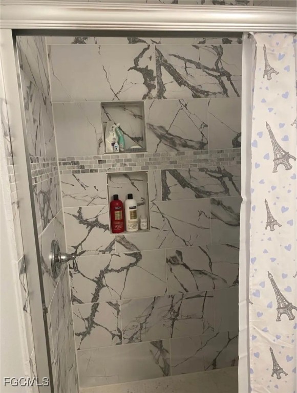 5230 32nd Avenue Southwest Naples, FL 34116 - Photo 10 of 11 a bathroom with a shower