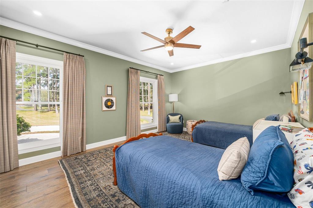 623 Southwest 93rd Street Gainesville, FL 32607 - Photo 53 of 100 a bedroom with a bed and window