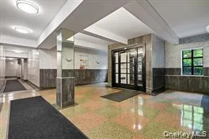 a view of a living room and a balcony