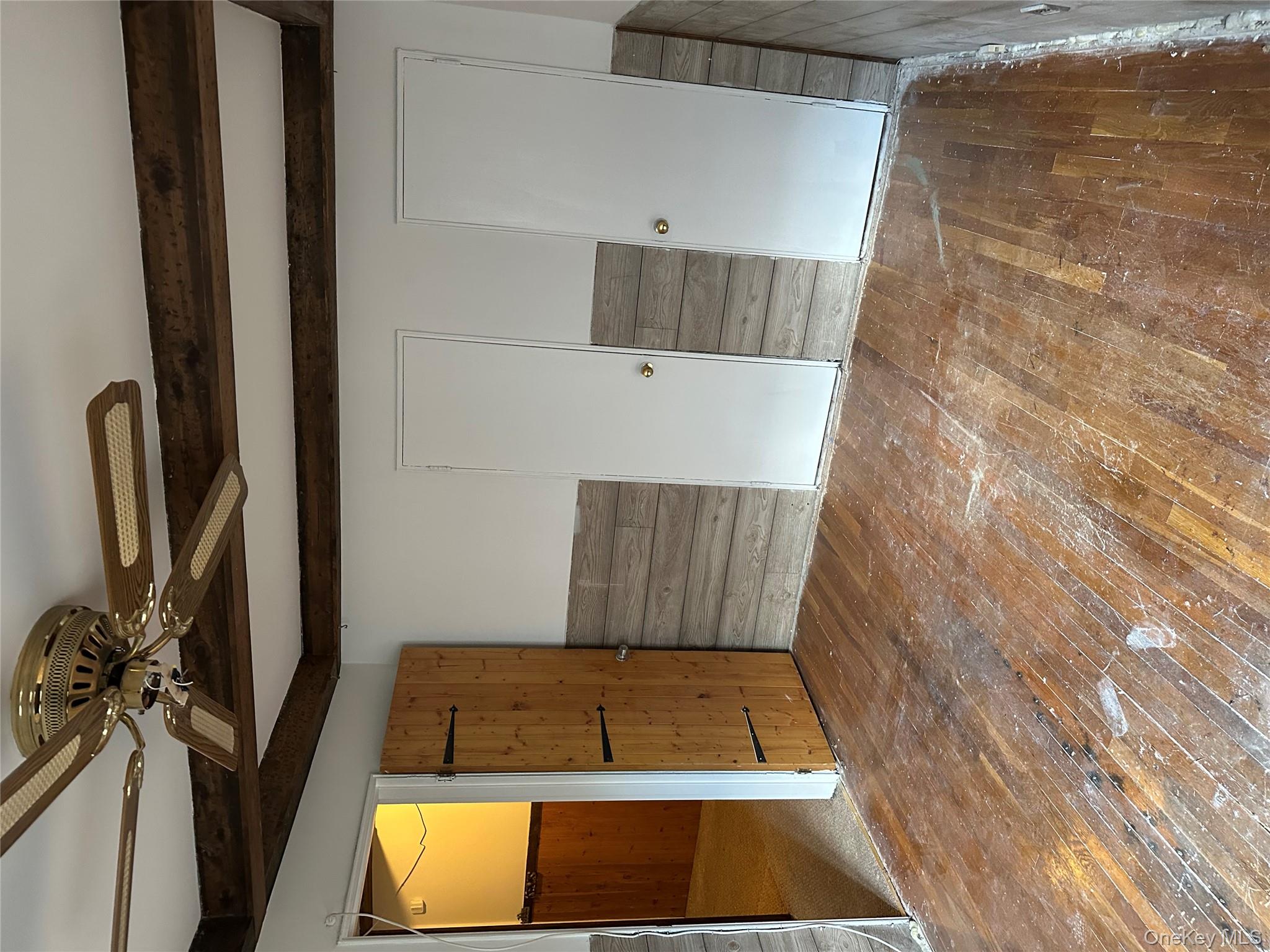 83-25 98th Street, Unit 4T Queens, NY 11421 - Photo 8 of 10 a view of an empty room with a window