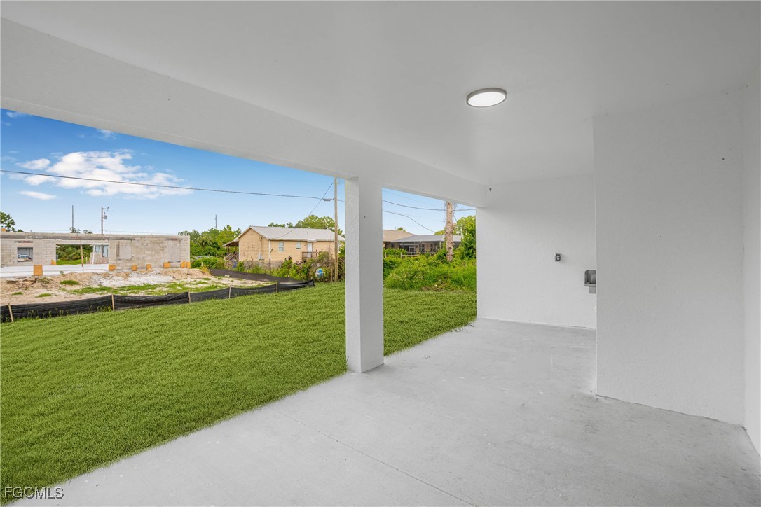 3310 3rd Street Southwest Lehigh Acres, FL 33976 - Photo 21 of 23 a view of a garden and basketball court