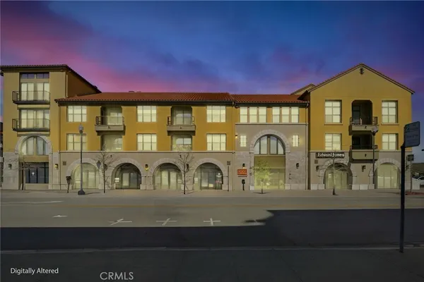 a front view of a house with parking