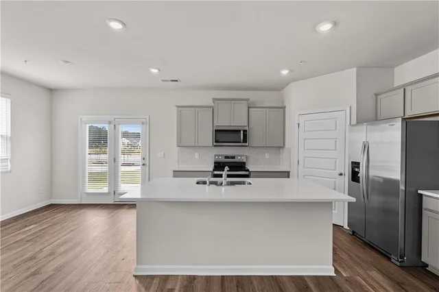 an empty room with windows