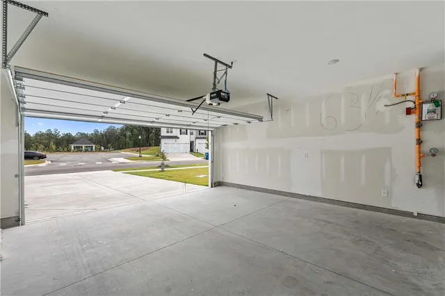 a view of a backyard with swimming pool