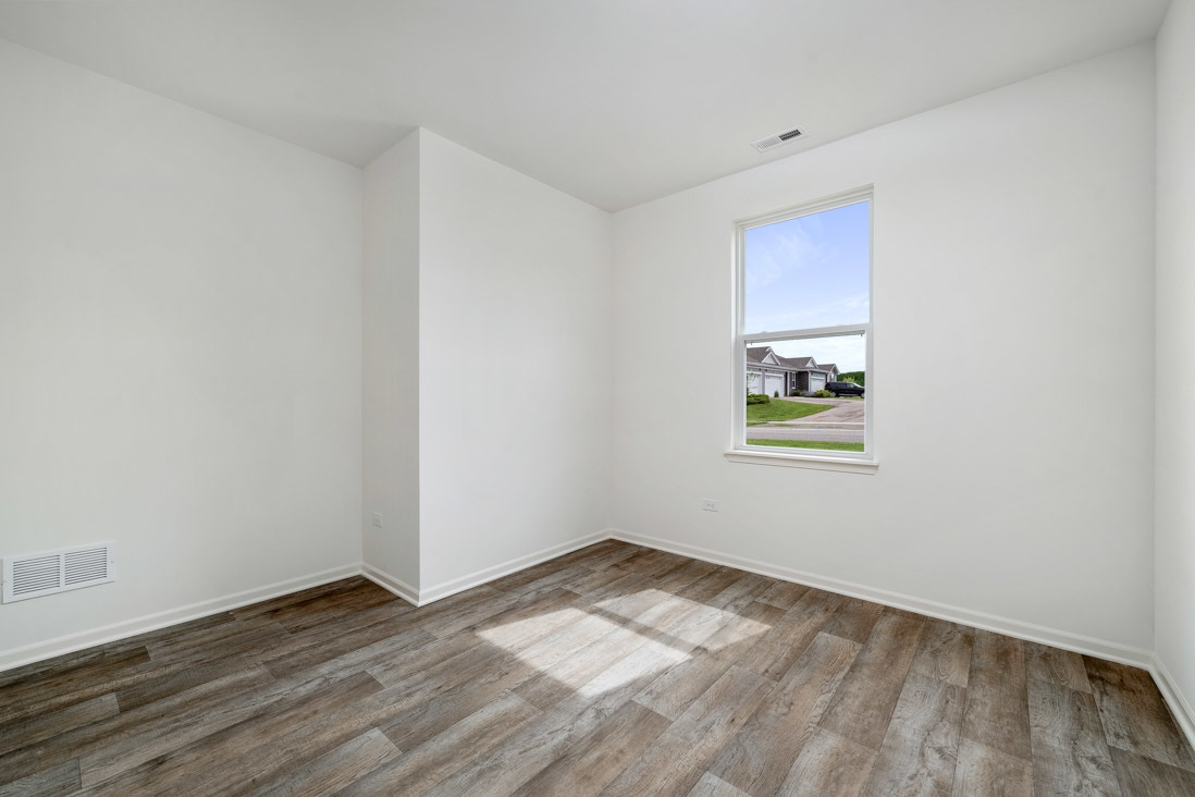 929 Darwin Street North Aurora, IL 60542 - Photo 11 of 42 a view of empty room with wooden floor
