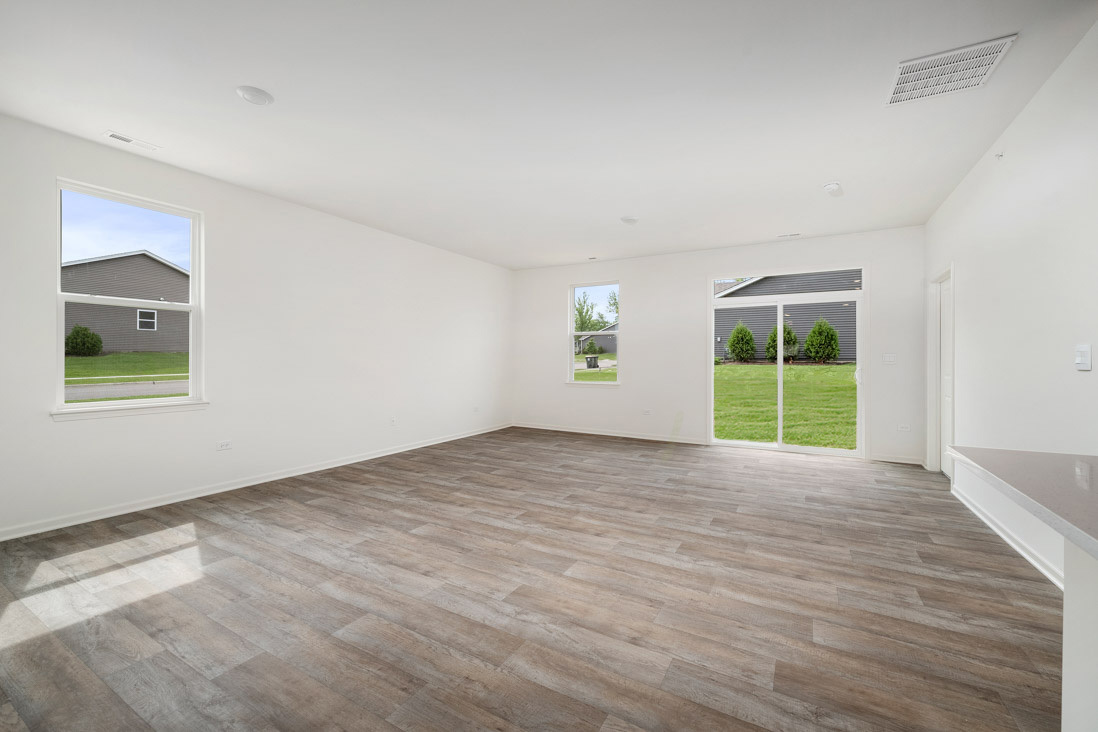 929 Darwin Street North Aurora, IL 60542 - Photo 8 of 42 a view of an empty room with a window