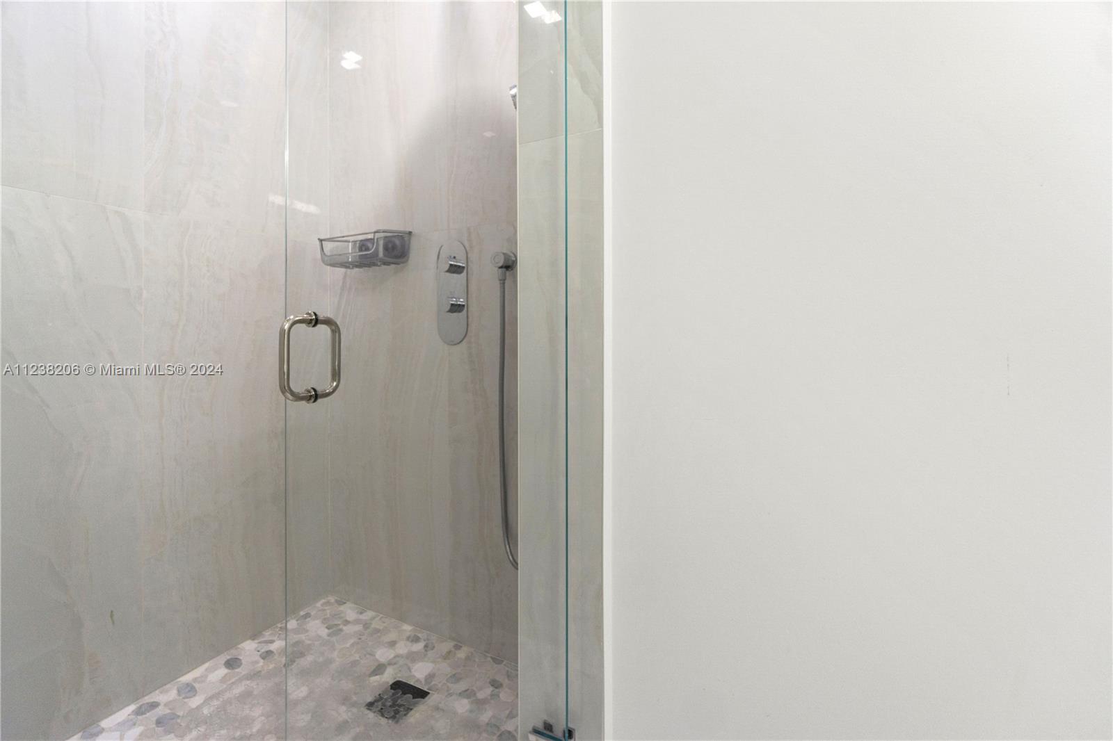 100 Lincoln Road, Unit 1608 Miami Beach, FL 33139 - Photo 14 of 22 a bathroom with a shower