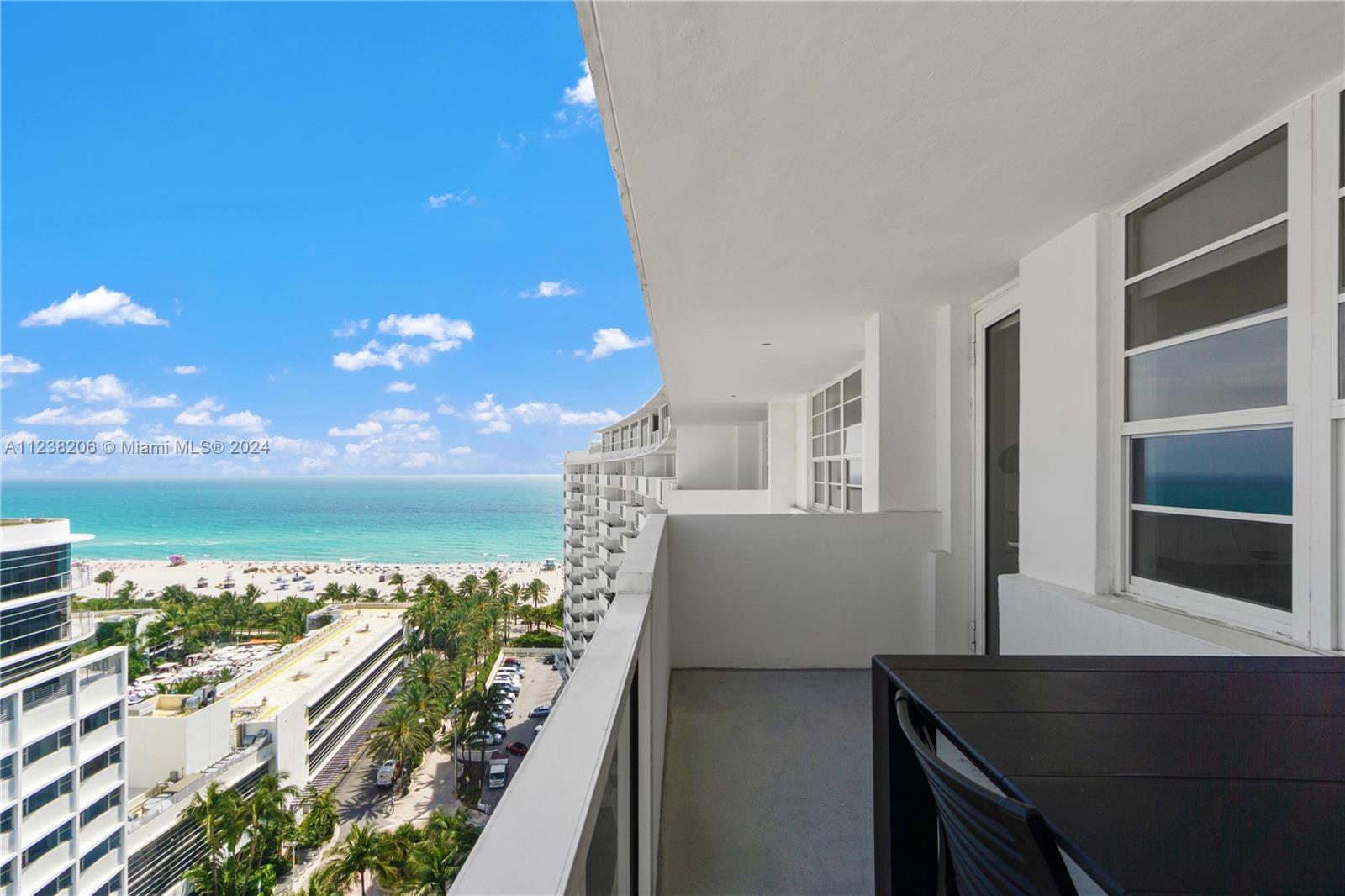 100 Lincoln Road, Unit 1608 Miami Beach, FL 33139 - Photo 21 of 22 a view of balcony with two ocean and a potted plant