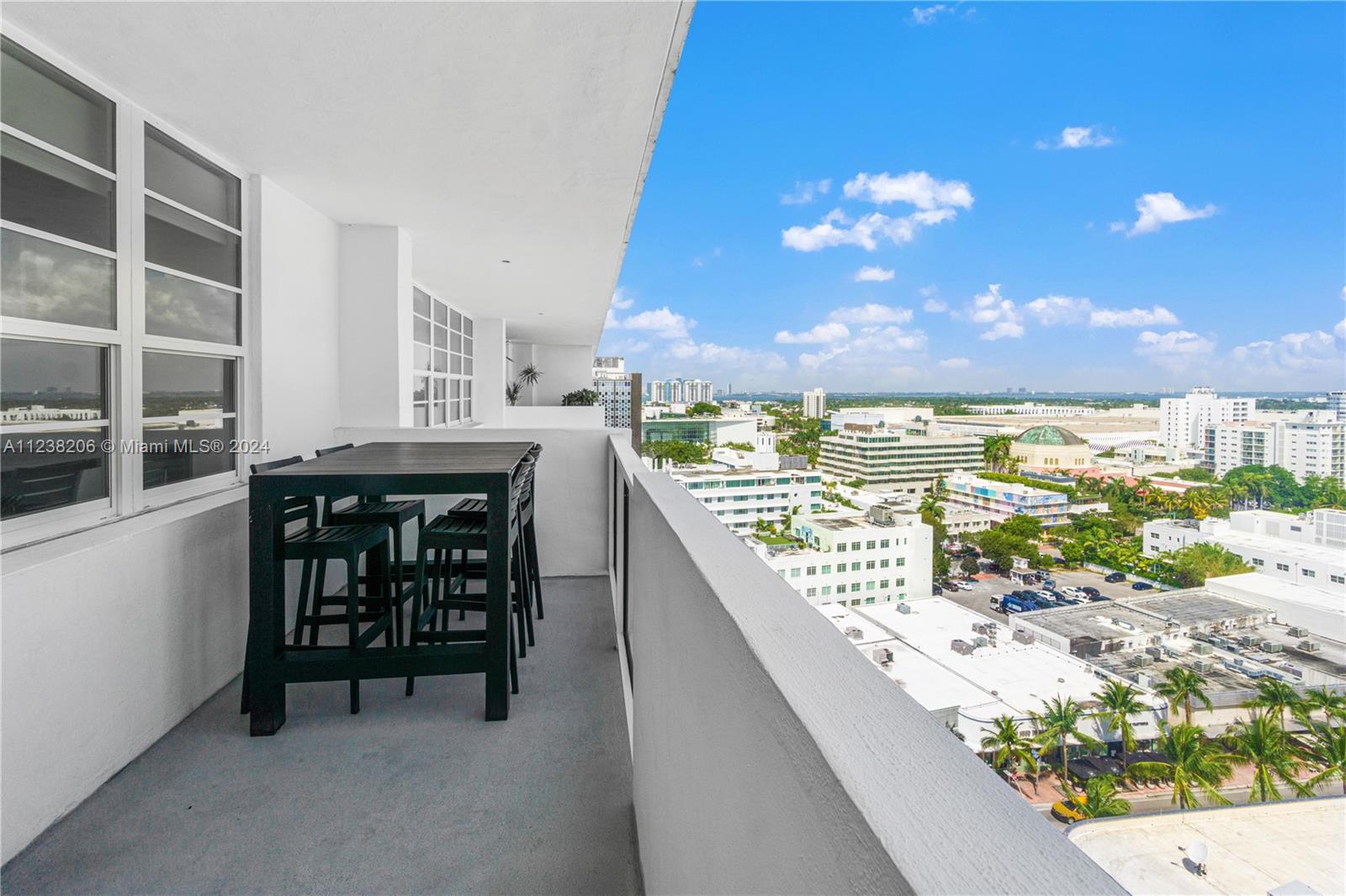100 Lincoln Road, Unit 1608 Miami Beach, FL 33139 - Photo 22 of 22 a view of swimming pool with outdoor seating