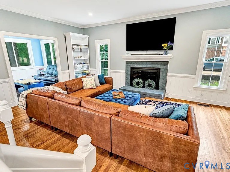 13904 Sunrise Bluff Road Midlothian, VA 23112 - Photo 15 of 45 Living area with a wainscoted wall, healthy amount
