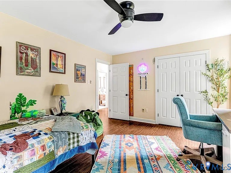 13904 Sunrise Bluff Road Midlothian, VA 23112 - Photo 28 of 45 Bedroom featuring a closet, ceiling fan, wood fini