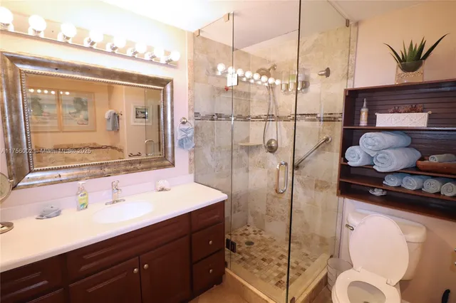 a bathroom with a bathtub and a toilet