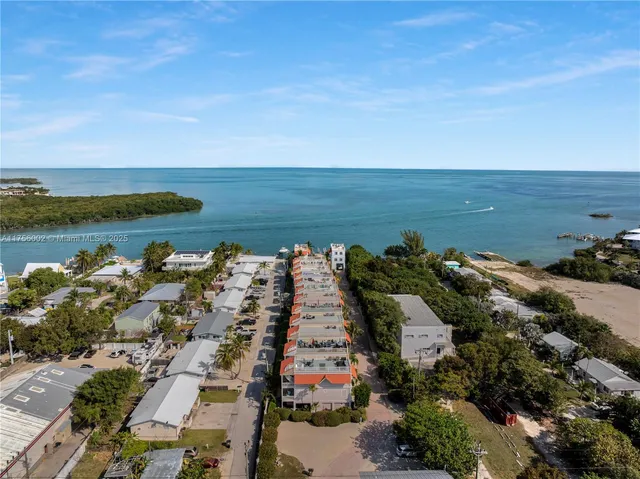 an aerial view of beach and ocean