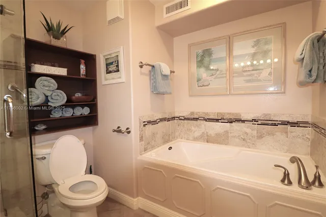 a view of a hallway with washer and dryer