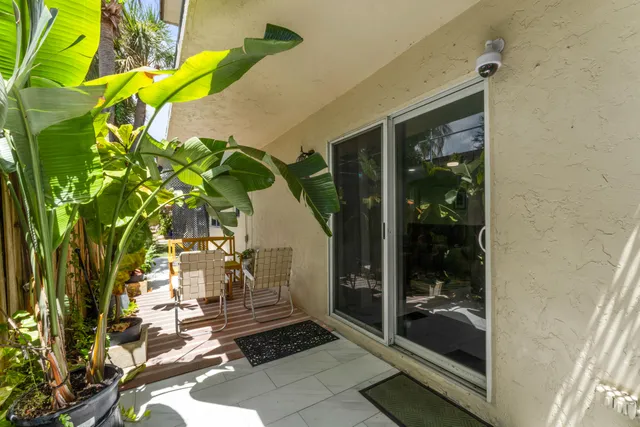 a view of a swimming pool with a yard