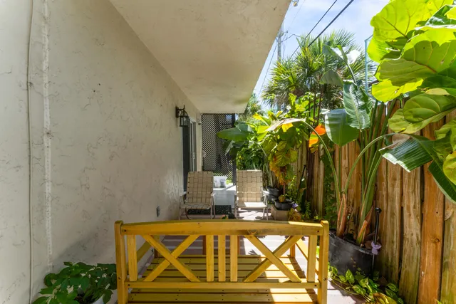 a view of bedroom with wooden floor and stairs