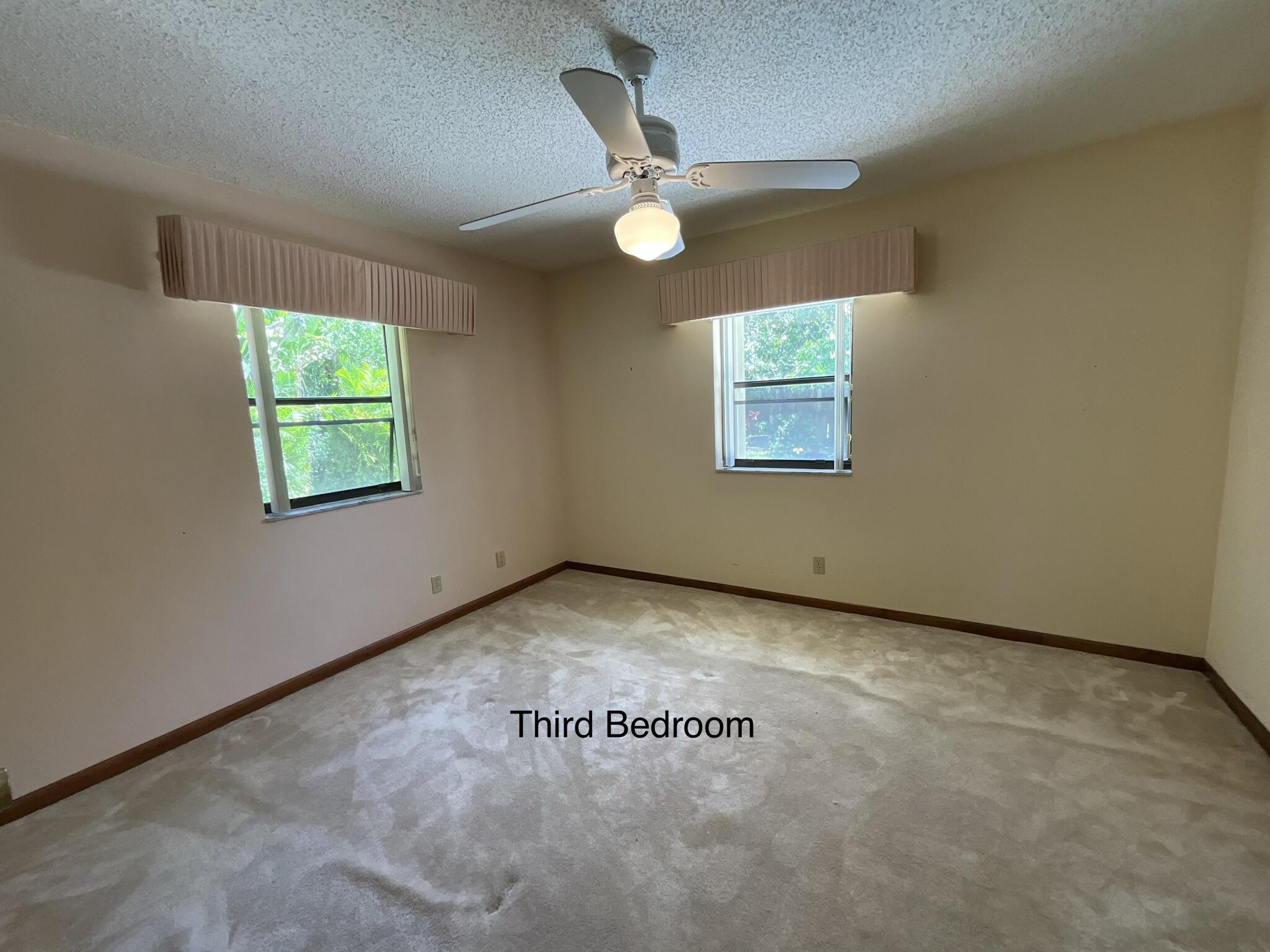 6114 Woodbury Road Boca Raton, FL 33433 - Photo 20 of 30 Third Bedroom