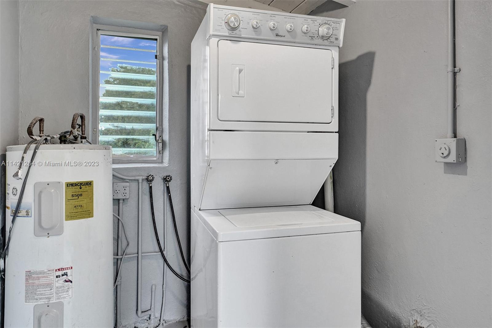 434 Southwest 22nd Terrace Fort Lauderdale, FL 33312 - Photo 12 of 15 a utility room with dryer and washer