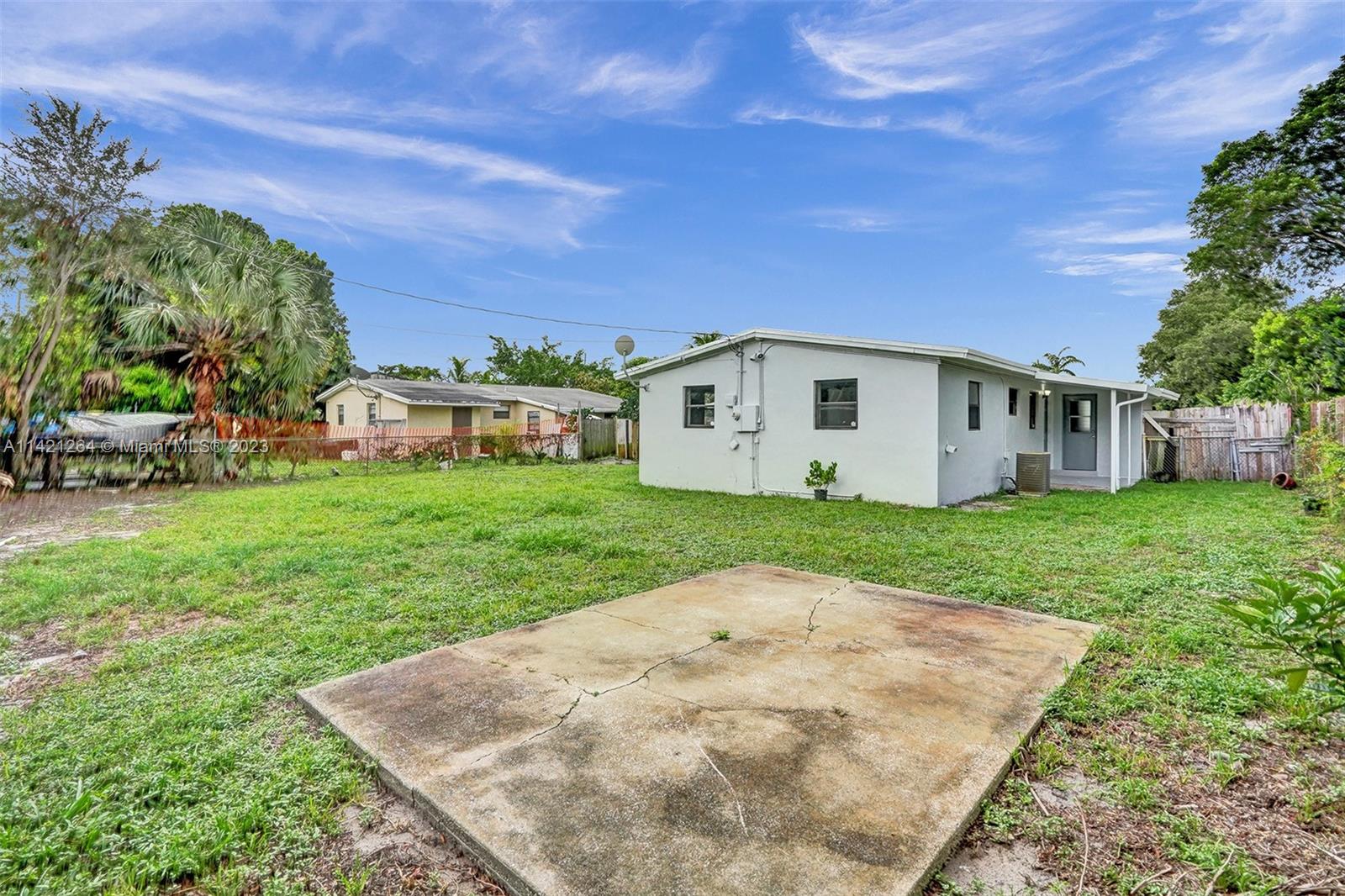 434 Southwest 22nd Terrace Fort Lauderdale, FL 33312 - Photo 13 of 15 a view of a house with a yard
