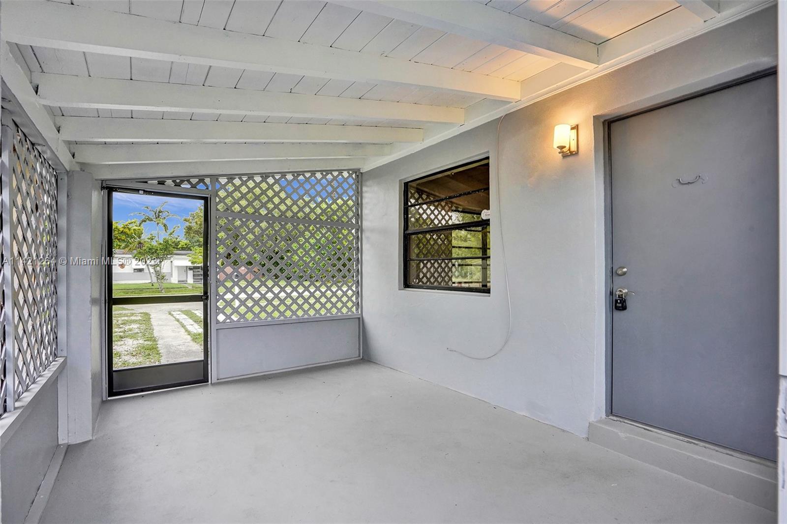434 Southwest 22nd Terrace Fort Lauderdale, FL 33312 - Photo 3 of 15 a view of an empty room with a window