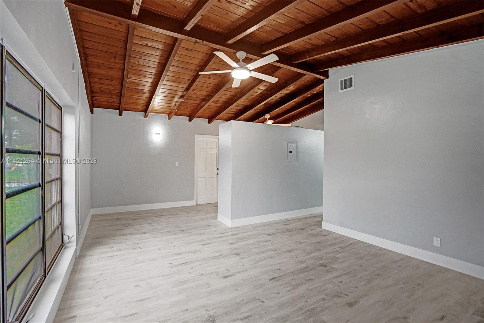 434 Southwest 22nd Terrace Fort Lauderdale, FL 33312 - Photo 7 of 15 a view of hallway with wooden floor