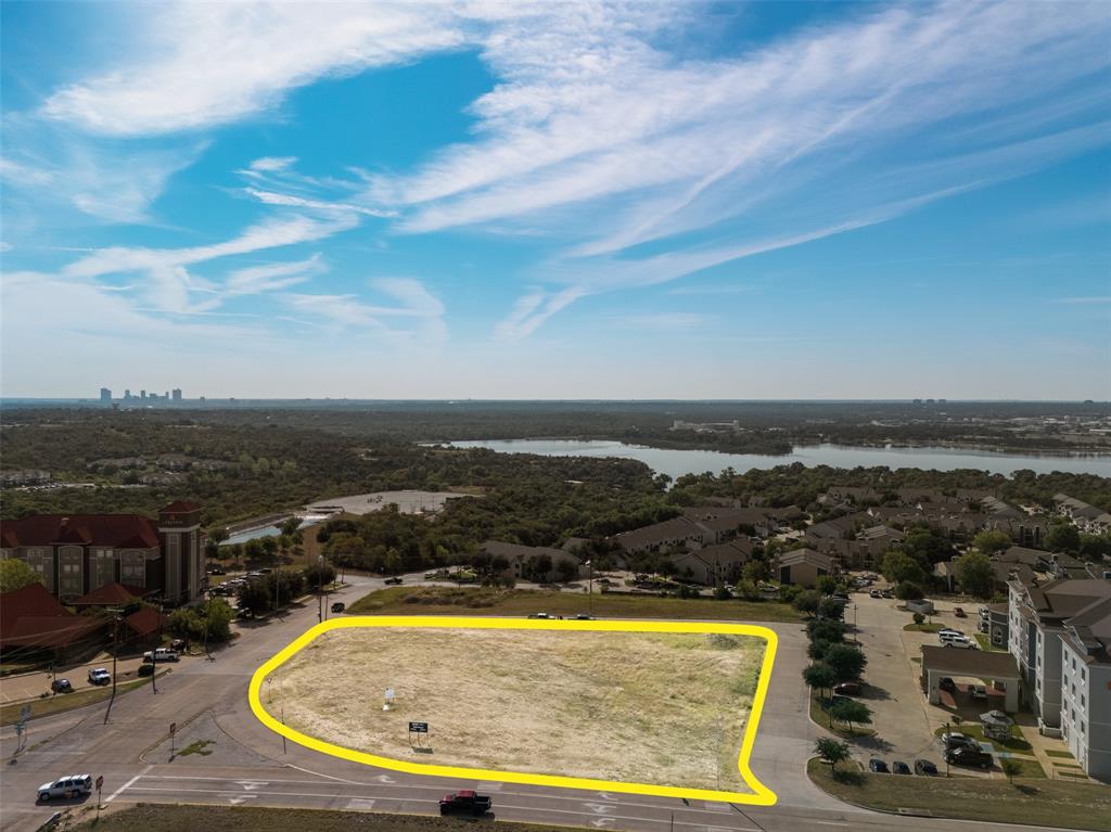 6501 Northwest Loop 820 Fort Worth, TX 76135 - Photo 8 of 9 Aerial overview of property's location with a nearby body of water and property boundaries highlighted