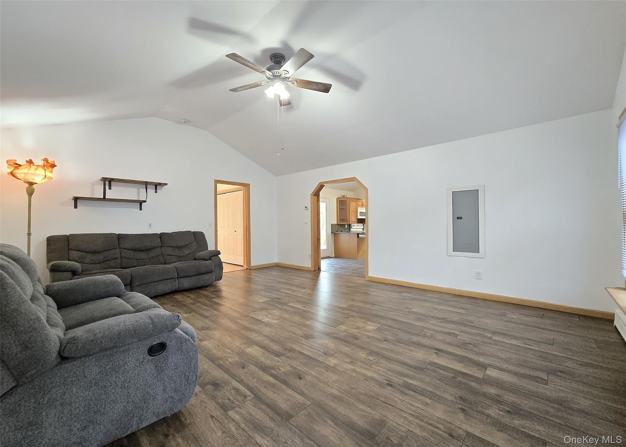 27 Forest Trail Ridge, NY 11961 - Photo 14 of 29 Updated Laminate Hardwood Flooring & Ceiling Fan. This Room Leads To The Primary Bedrm Ensuite.