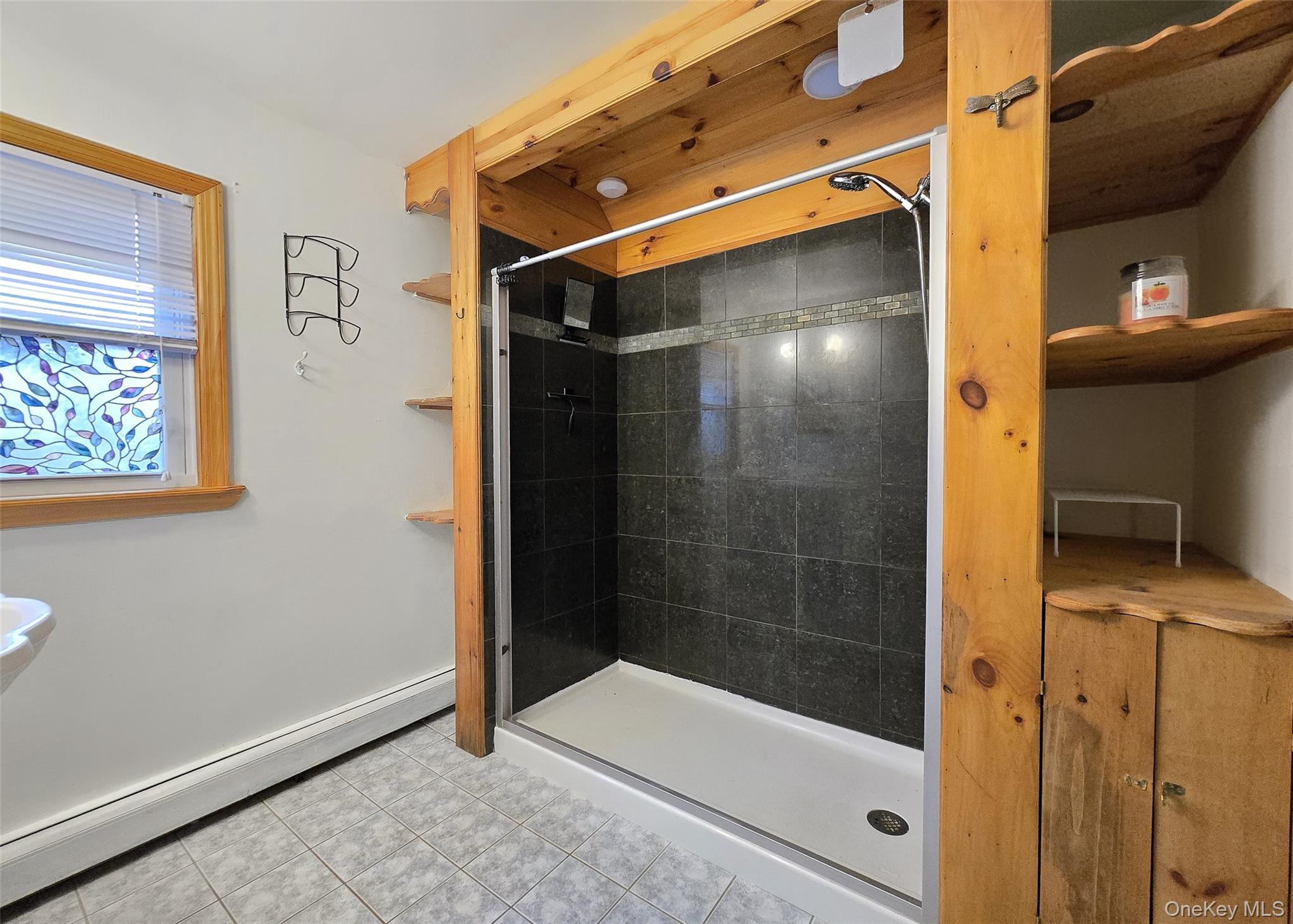 27 Forest Trail Ridge, NY 11961 - Photo 18 of 29 Private Updated Bath Featuring Cedar Accents & Walk-In Tiled Shower WMosaics.