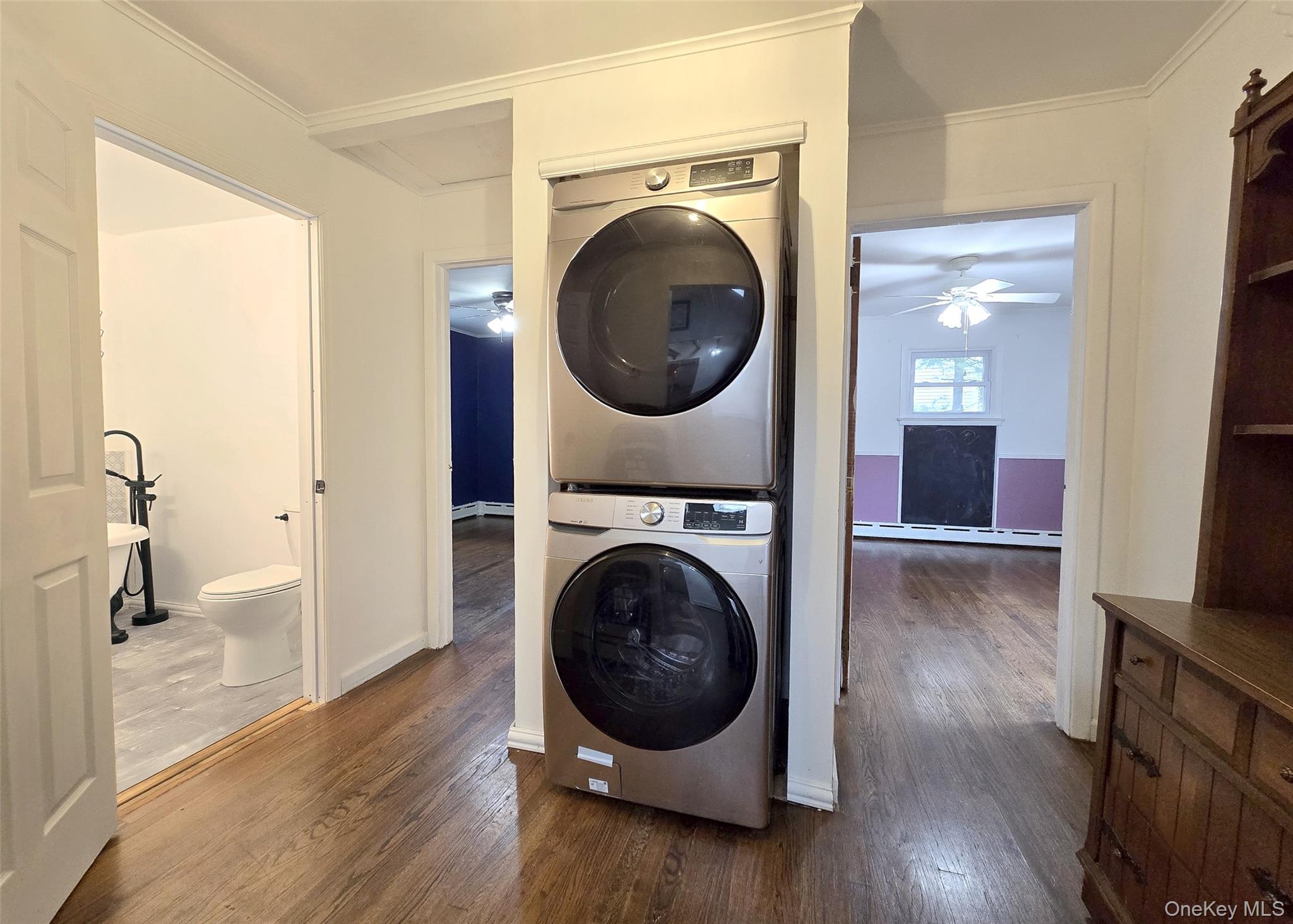 27 Forest Trail Ridge, NY 11961 - Photo 20 of 29 Laundry Area Located In The Main Hall & Is Equipped W/Stainless Steel Front-Loading Washer/Dryer (Apprx 5Yrs Old).