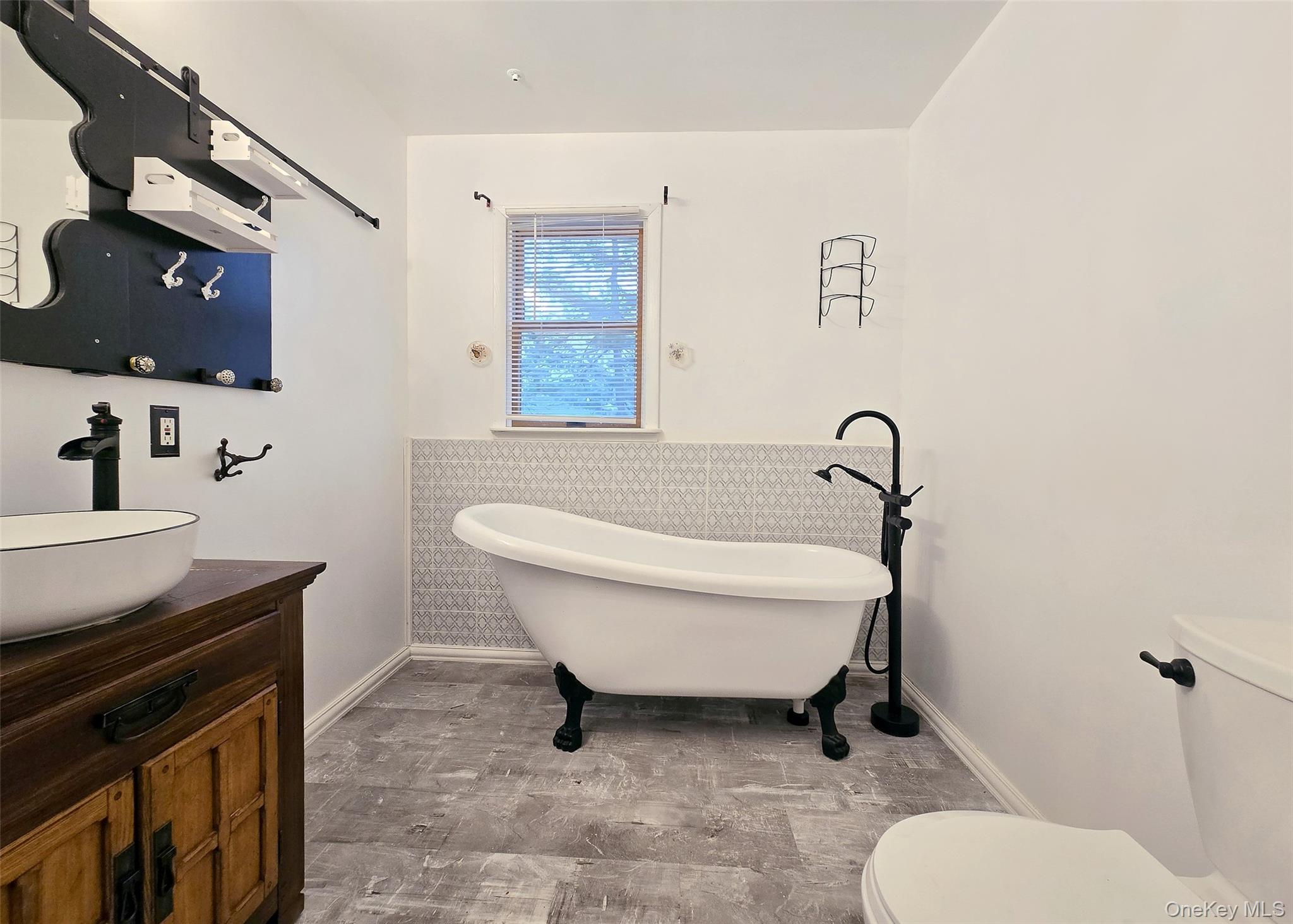 27 Forest Trail Ridge, NY 11961 - Photo 21 of 29 Main 5Yr Young Bath Has Intricate Tilework & Clawfoot Tub.