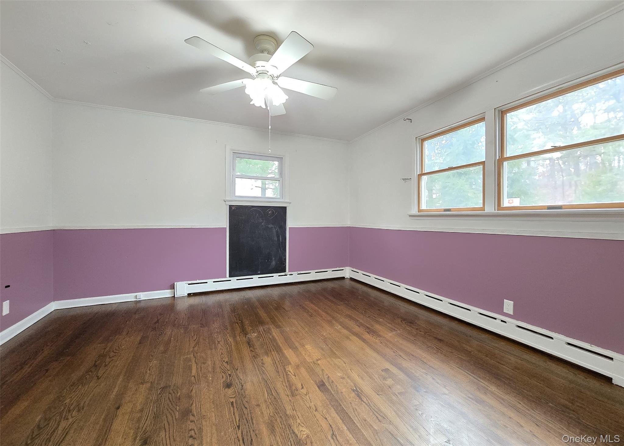 27 Forest Trail Ridge, NY 11961 - Photo 23 of 29 Spacious Bedrm W/Hardwood Flooring, Ceiling Fan, & Ample Closet Space.