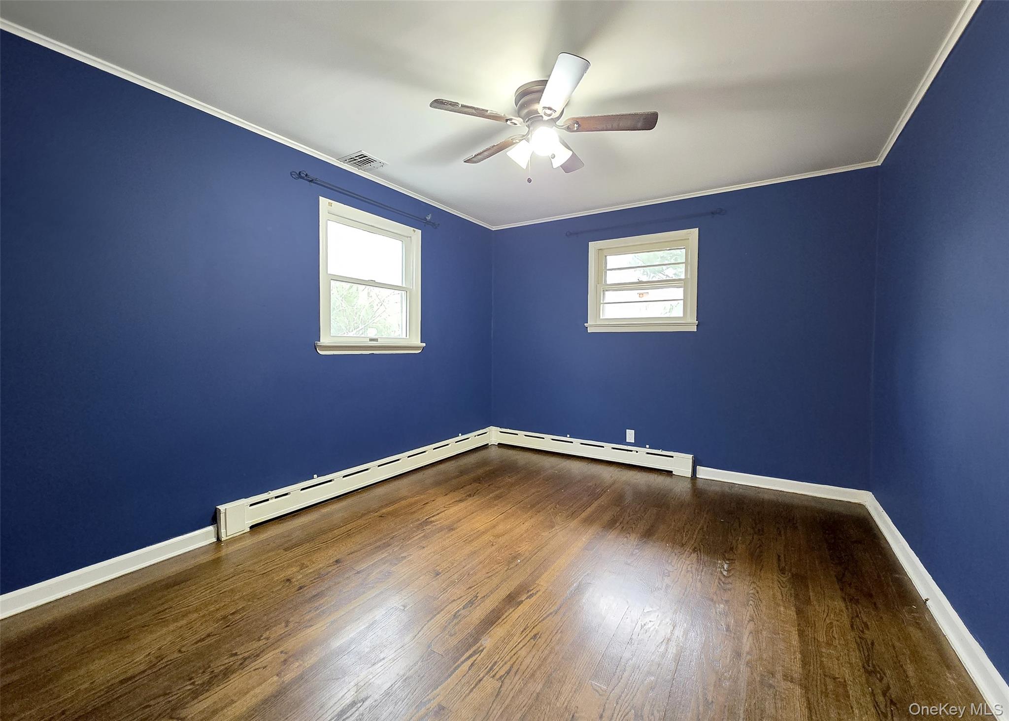 27 Forest Trail Ridge, NY 11961 - Photo 24 of 29 Spacious Bedrm W/Hardwood Flooring, Ceiling Fan, & Ample Closet Space.