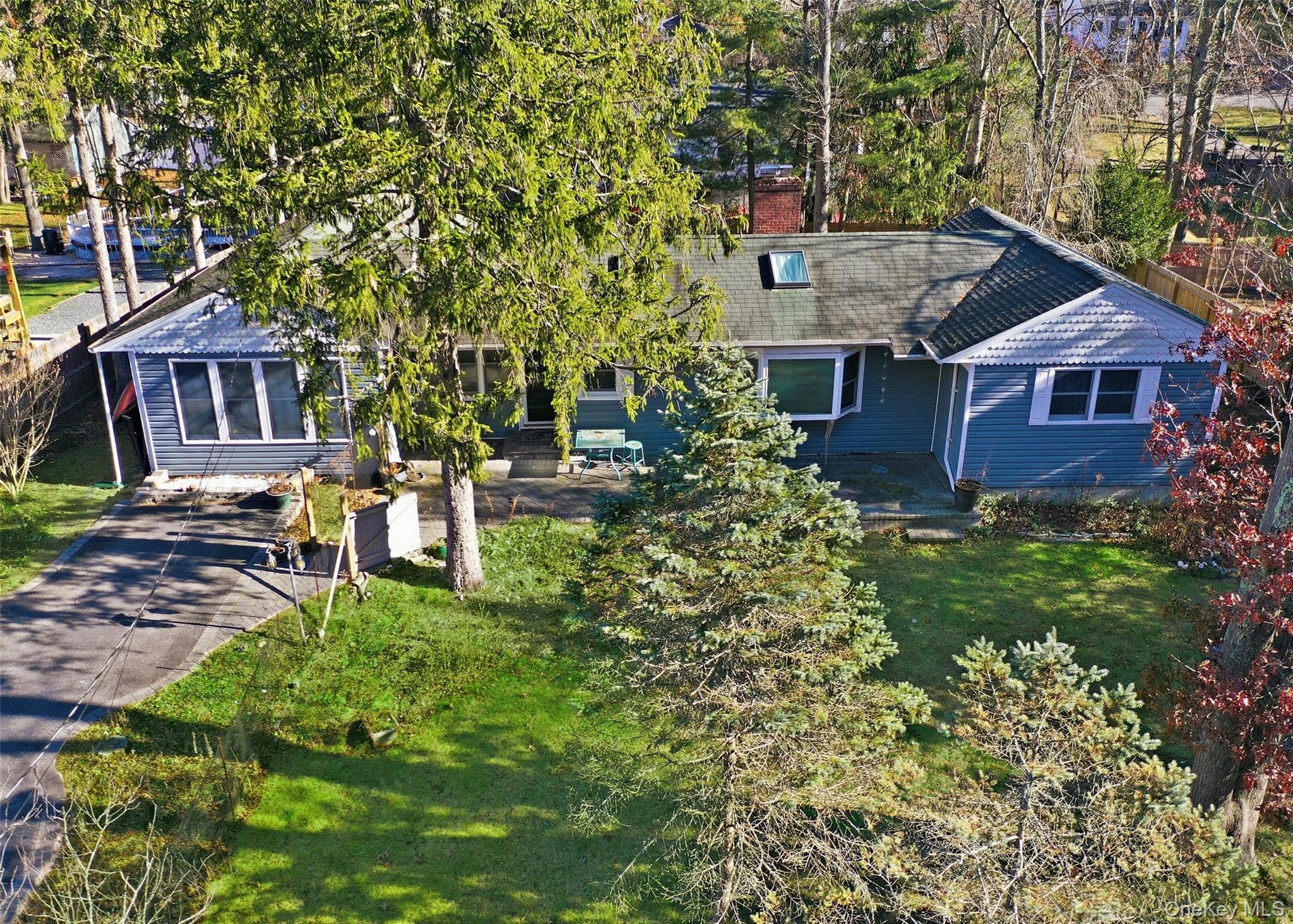 27 Forest Trail Ridge, NY 11961 - Photo 25 of 29 Paver Front Porch & Belgium Block Lined Driveway.