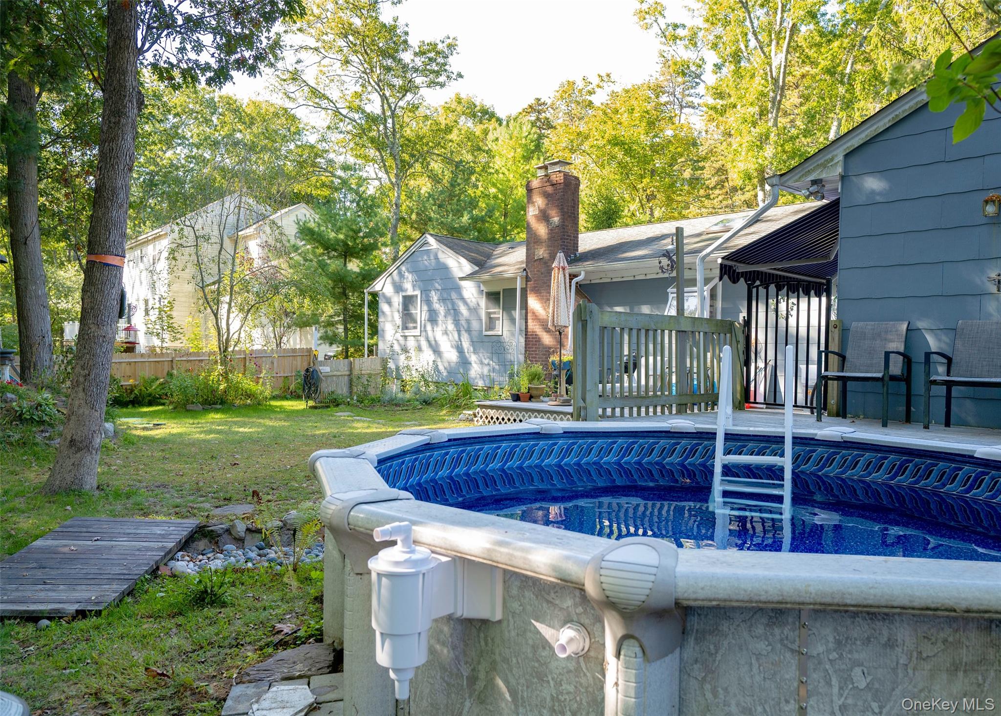 27 Forest Trail Ridge, NY 11961 - Photo 29 of 29 Above Ground Pool W/Decking, New Liner, & Major Repairs Completed This Year Along W/Pool Pump Replaced in 2022.