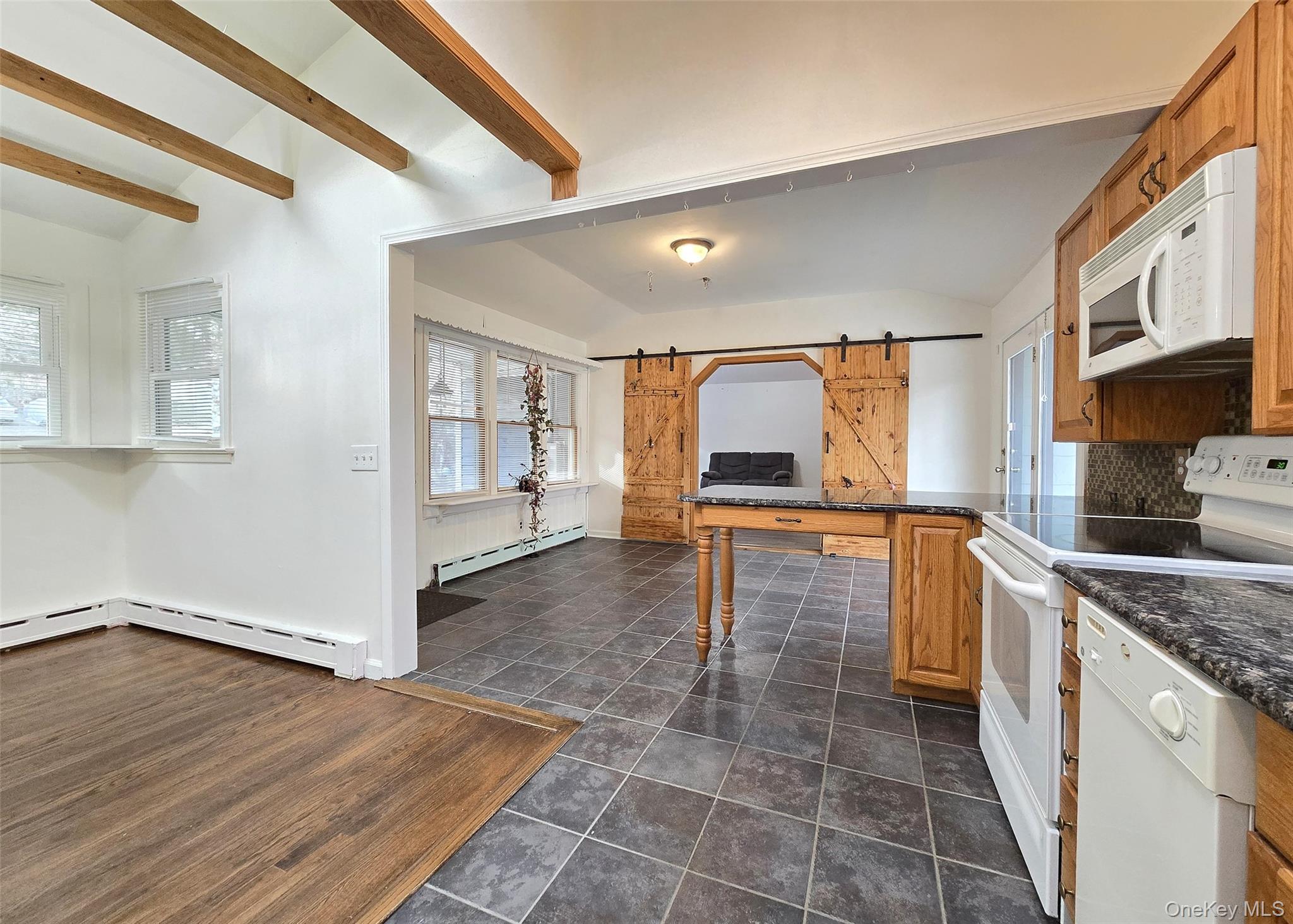 27 Forest Trail Ridge, NY 11961 - Photo 8 of 29 Seamless Flow Between Rooms.