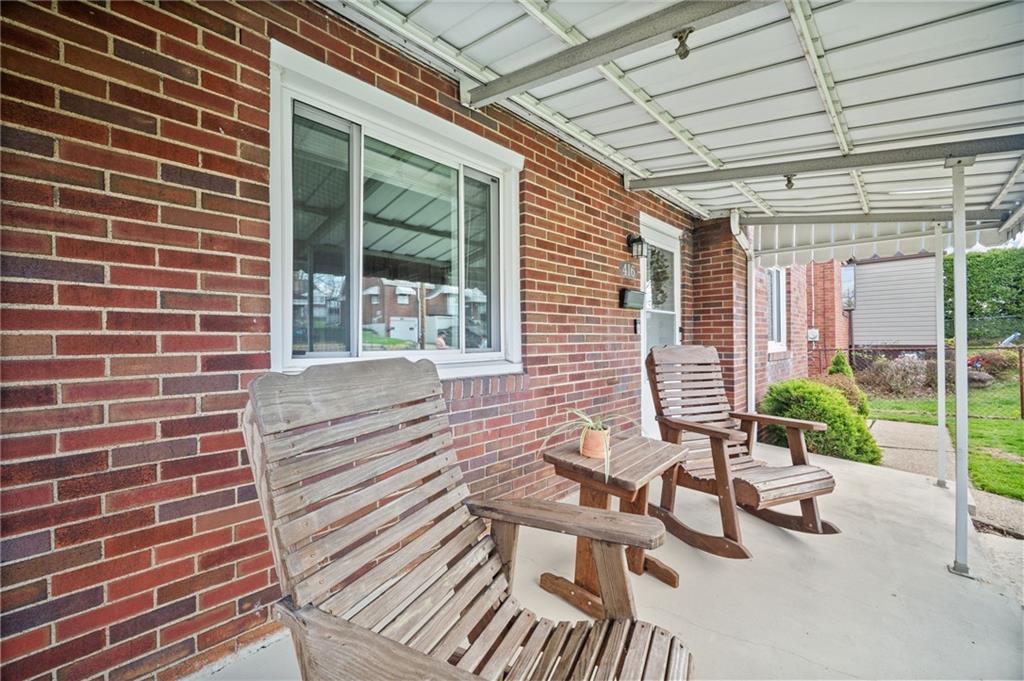 416 Phillips Avenue McKees Rocks, PA 15136 - Photo 36 of 46 a view of patio with a table and chairs and potted plants