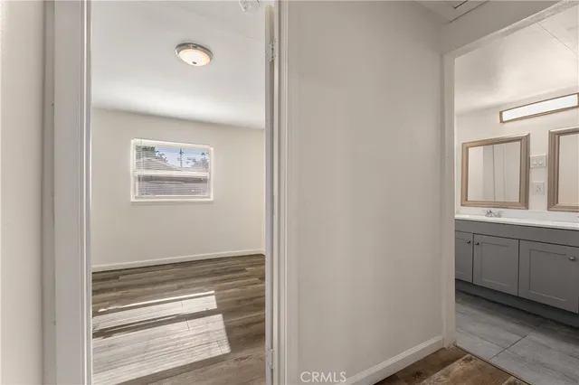 a view of a hallway and closet area