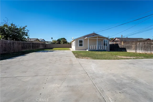 a view of a back yard of the house