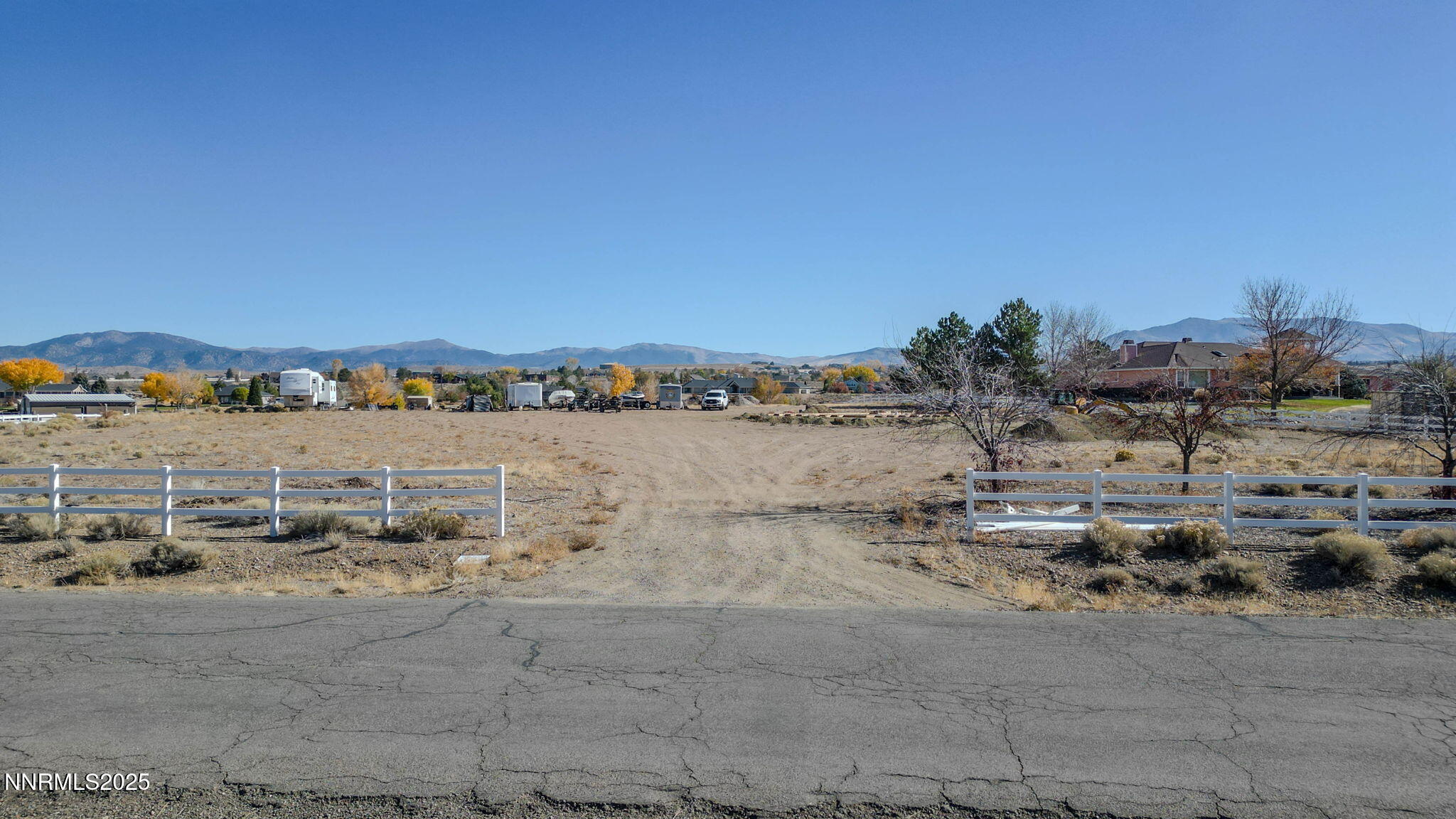 1527 Sanchez Road Gardnerville, NV 89410 - Photo 15 of 32 a view of a lake with houses in the back